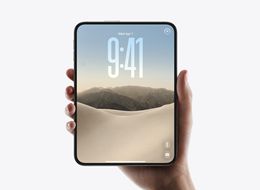 Hand holding an unfolded white phone like a book